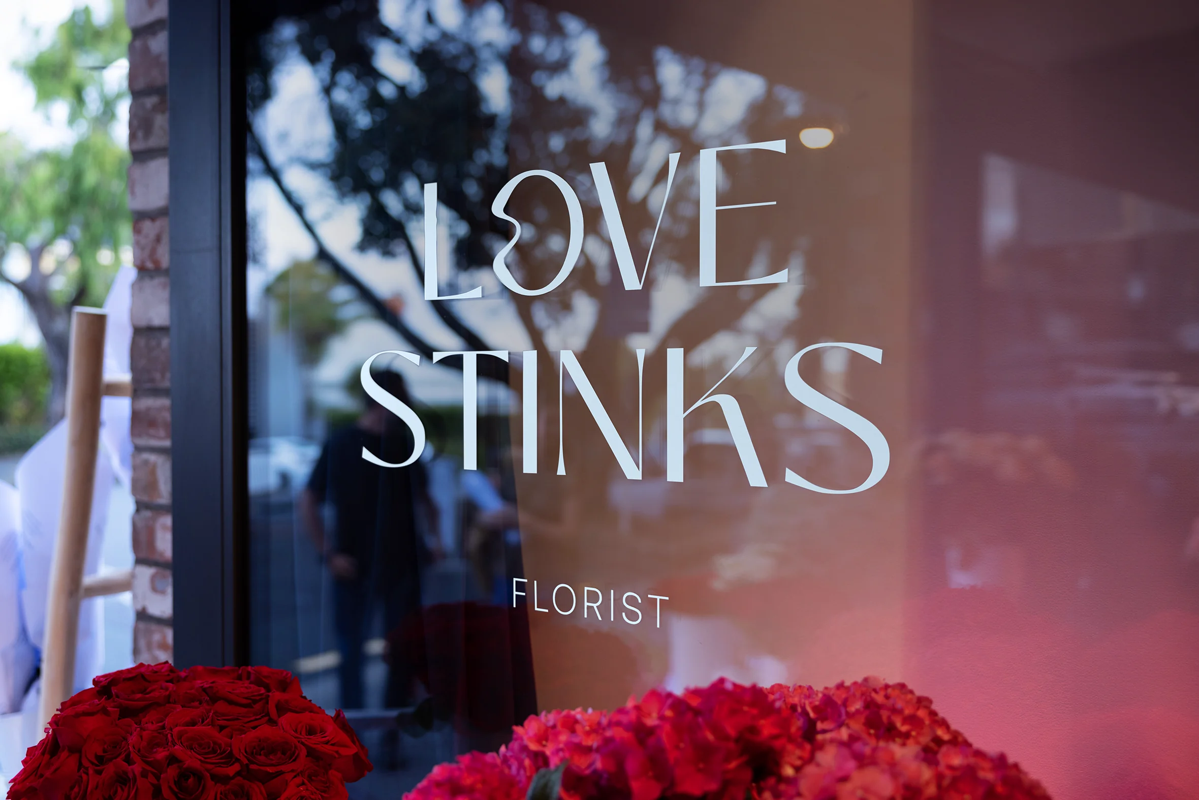 Love Stinks Window